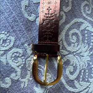 Etro embossed leather copper color wide bet with gold colored buckle. Made in it